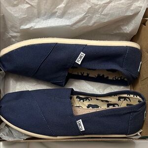 Tom’s woman’s Navy Alpargata slip ins 9.5